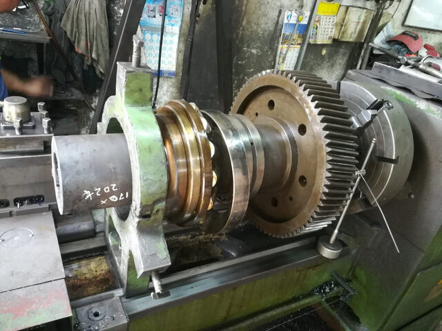 Gear and shaft assembly repair on lathe